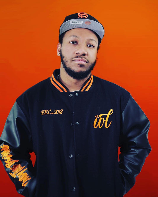 Ivory Lee's black & orange "Buried Alive" varsity jacket